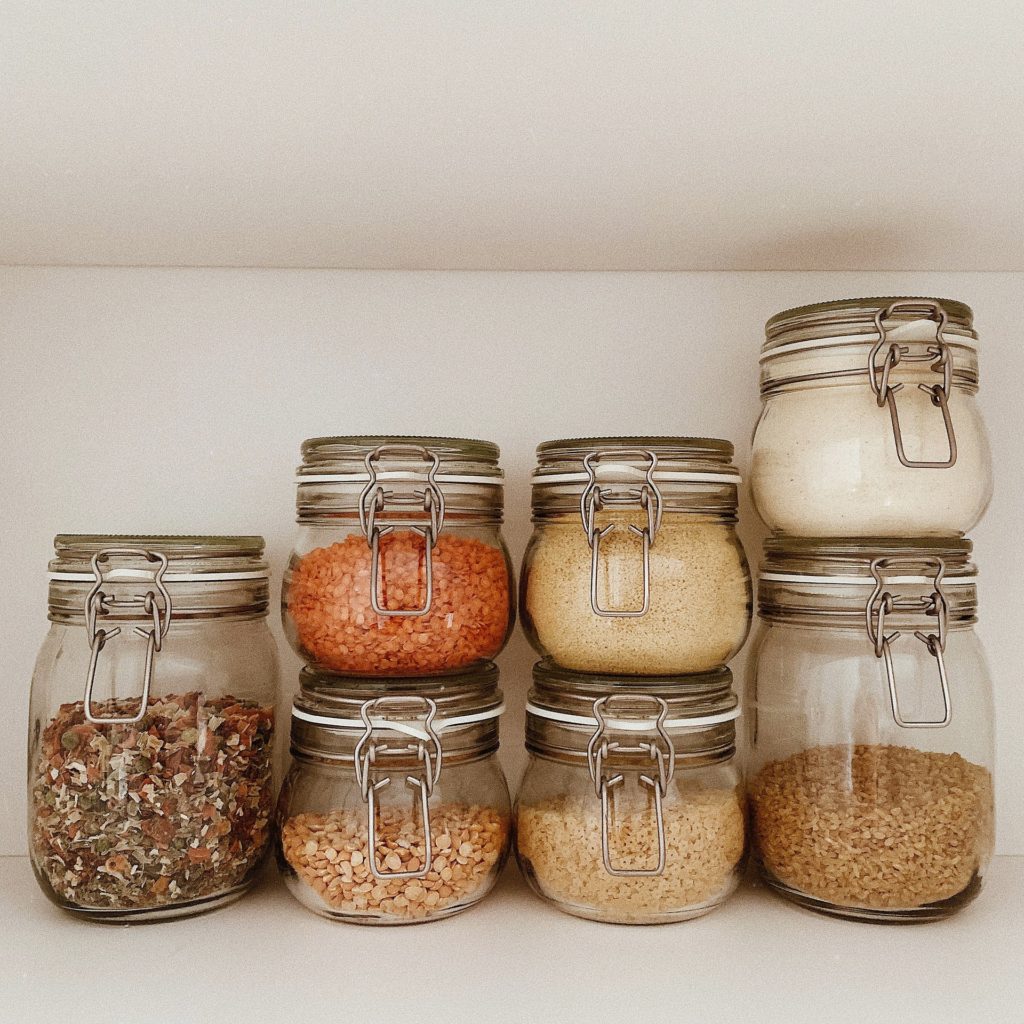 organised pantry of pulses, brown rice, quinoa