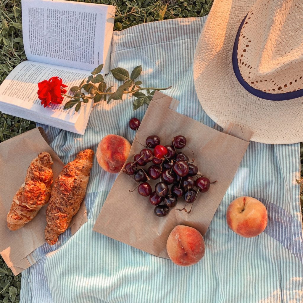 picnic vibes during weekends vacations with snacks and reading