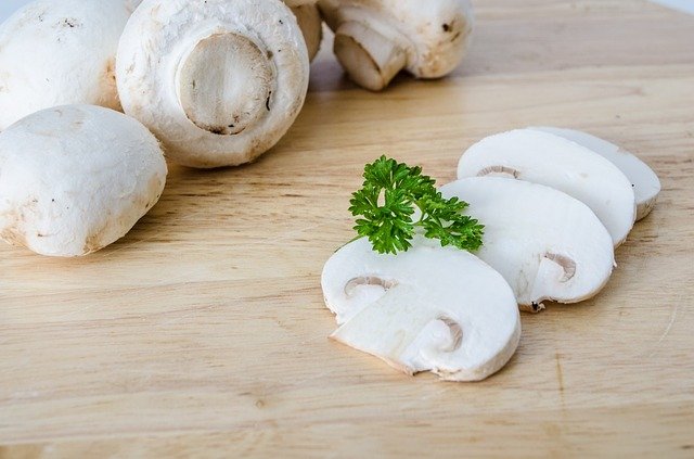 mushrooms are chopped to store in the refrigerator