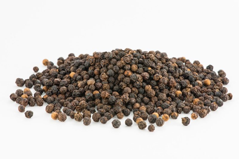 black pepper corns in Indian market used to make Indian curries