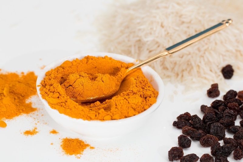 turmeric powder in the Indian market to make curries