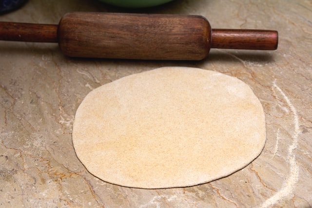 chapati/roti dough which is flattened