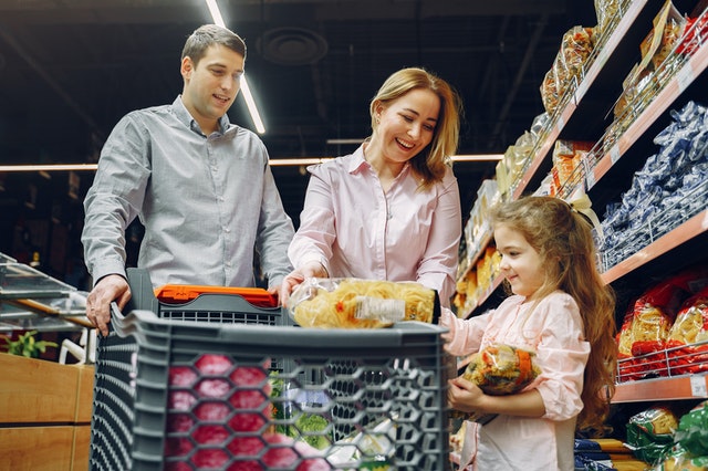 family buying bulk groceries 